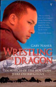 Wrestling the dragon: in Search of the boy Lama who dified China.